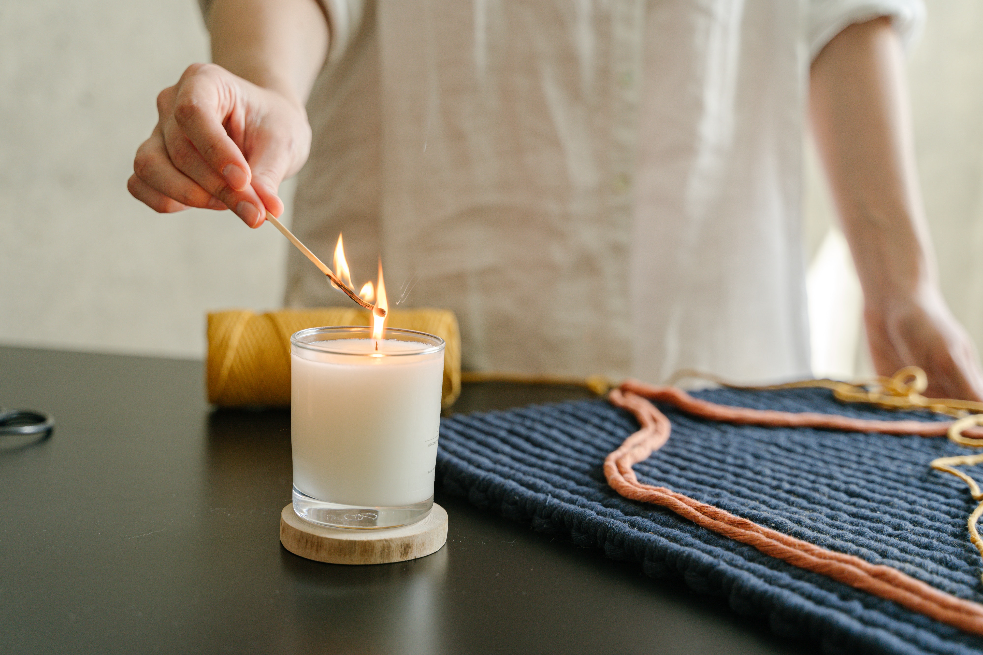 One trick to help you get rid of candle stains on your clothes.