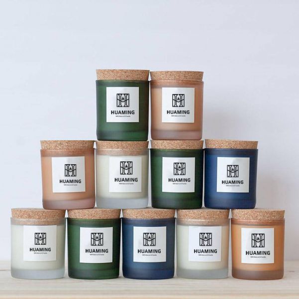 Multi-colored cork lid frosted glass soy wax scented candles