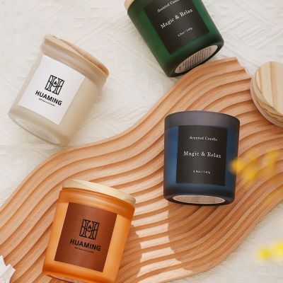 Multi-colored cork lid frosted glass soy wax scented candles