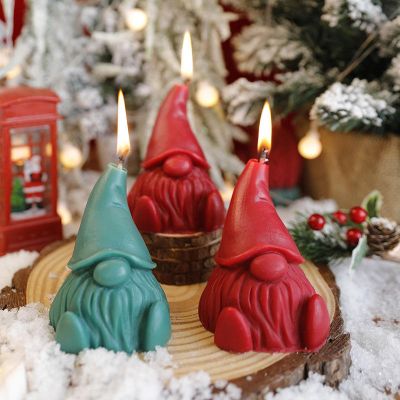 Red and green Christmas elf dwarf festive decoration candle