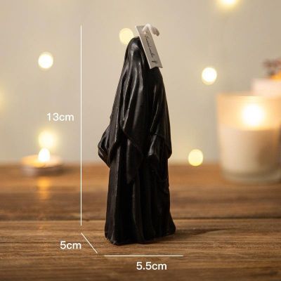 Halloween black, white, gray and orange scary ghost shaped candle decorations
