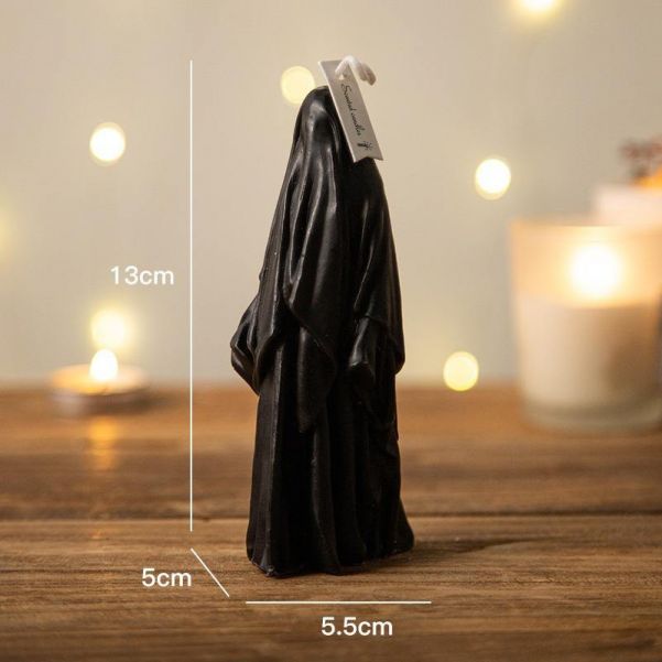 Halloween black, white, gray and orange scary ghost shaped candle decorations