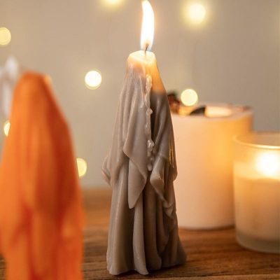 Halloween black, white, gray and orange scary ghost shaped candle decorations